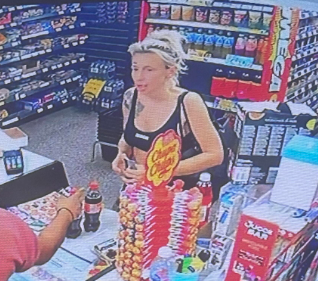 CCTV image of a woman at a shop