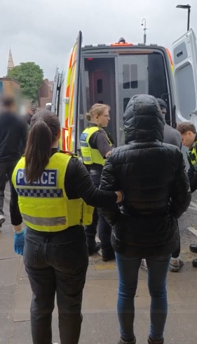 Police officers arrest multiple suspects 